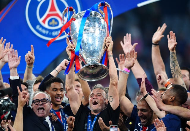 Paris St-Germain boss Luis Enrique with the trophy after winning last season's Champions League final