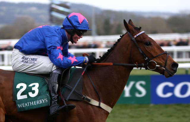 Cue Card winning the Champion Bumper under Joe Tizzard