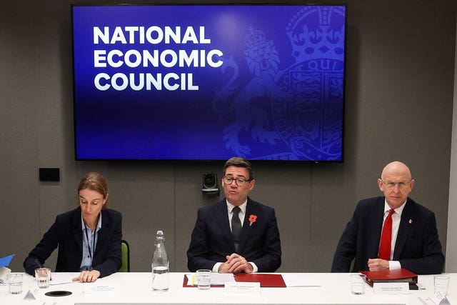 Prime Minister Andy Burnham chairing a meeting of the National Economic Council alongside John Healey (right)