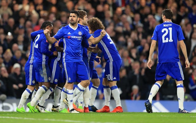 The winning goal on that occasion came from N'Golo Kante, who is mobbed by happy team-mates in this picture