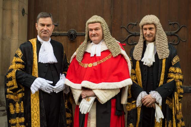 Lord Chancellor David Gauke (left) poses for a photo with Lord Chief Justice Lord Thomas of Cwmgiedd (centre) and Master of the Rolls Sir Terence Etherton (right) as he arrives for his swearing-in ceremony at the Royal Courts of Justice, in London (Dominic Lipinski/PA)