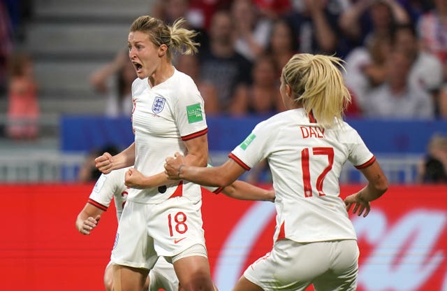 White, left, celebrates England's leveller