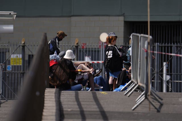 The Oasis fans at the front of the line, who began queueing from 8am, outside the Principality Stadium, Cardiff,