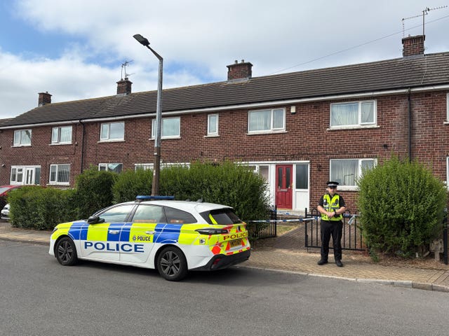 Police activity outside a house in Rotherham