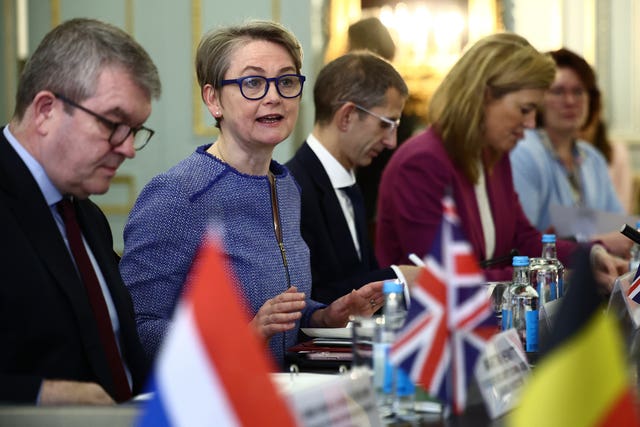 Yvette Cooper speaks at a meeting of the Calais Group, sitting next to other European home affairs ministers