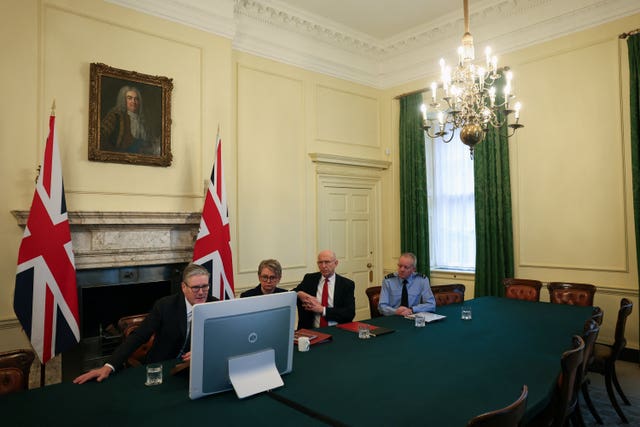 Prime Minister Sir Keir Starmer sits with Foreign Secretary Yvette Cooper, Defence Secretary John Healey and Chief of the Defence Staff Richard Knighton as he co-chairs a virtual call with members of the Coalition of the Willing, the countries prepared to offer support to Ukraine as efforts continued to find a peace deal to end the war with Vladimir Putin’s Russia