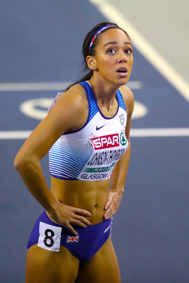 Katarina Johnson-Thompson looks up at the scoreboard after her hurdles heat