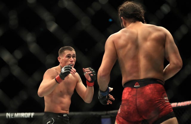 Darren Till (left) had taken the contest to Jorge Masvidal early on. (Simon Cooper/PA Images)