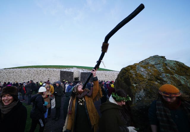 Deano Stapleton, from Finglas, plays his didgeridoo at Newgrange on the morning of the winter solstice