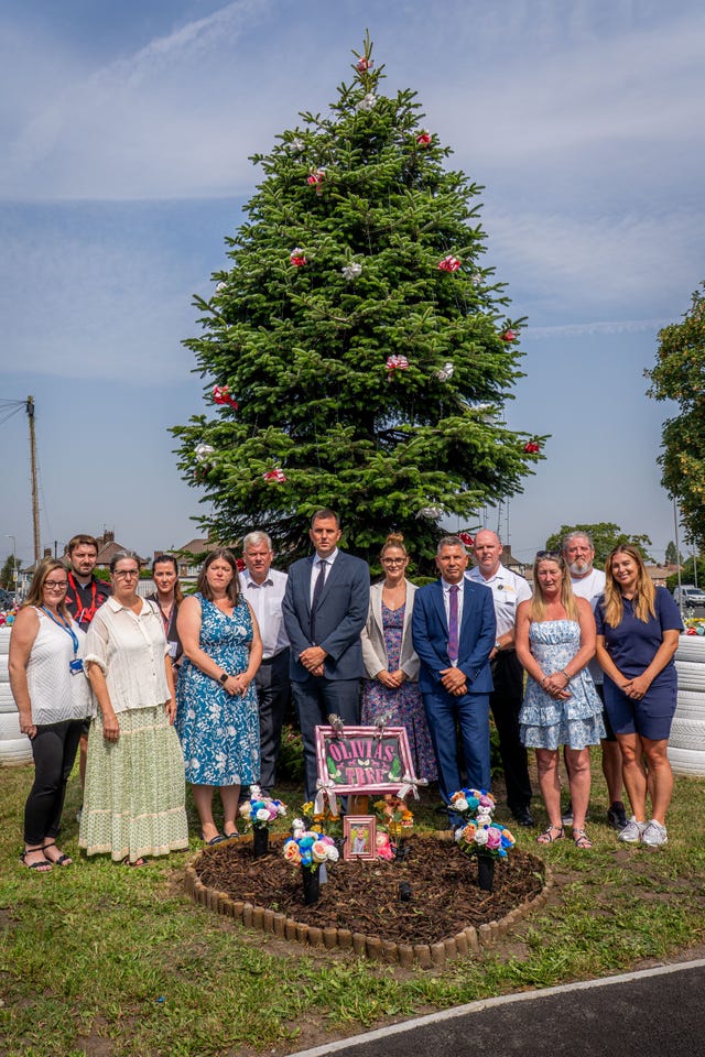 Olivia Pratt-Korbel’s mother Cheryl Korbel (third right) and Tim Edwards, father of shooting victim Elle Edwards (second right) with representatives of Merseyside Police and other organisations involved in the Evolve scheme