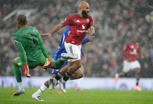 Robert Sanchez (left) brings down Bryan Mbeumo
