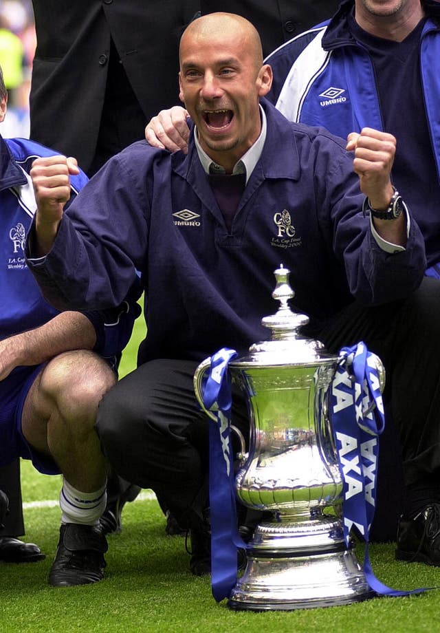 Gianluca Vialli celebrates with the FA Cup as Chelsea manager