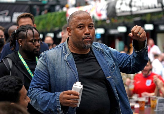 John Barnes has urged England's players to keep their feet on the ground