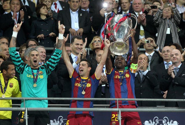 Xavi (centre) captained Barcelona to Champions League success in 2011 