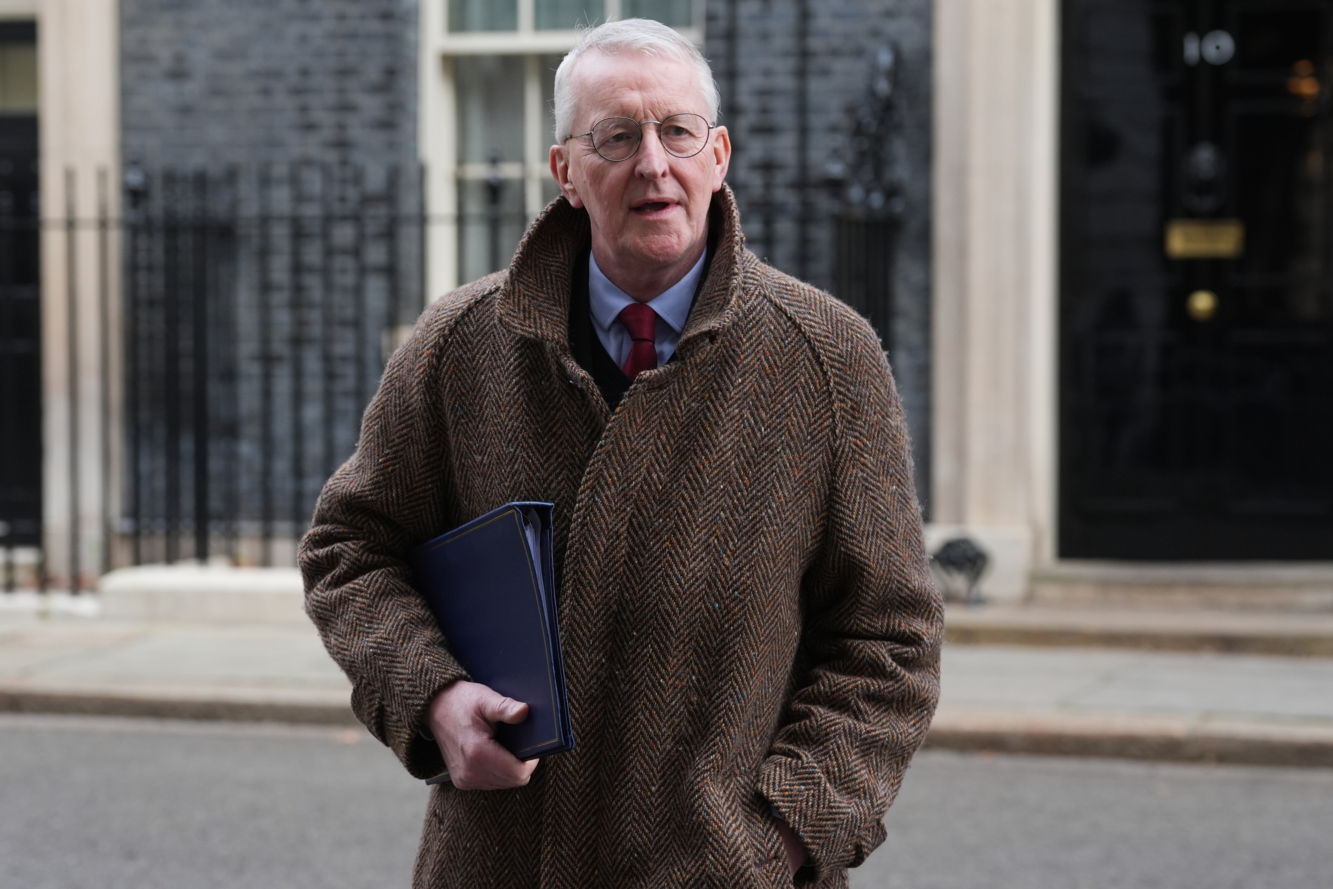 Northern Ireland Secretary Hilary Benn leaving 10 Downing Street, London, following a Cabinet meeting.