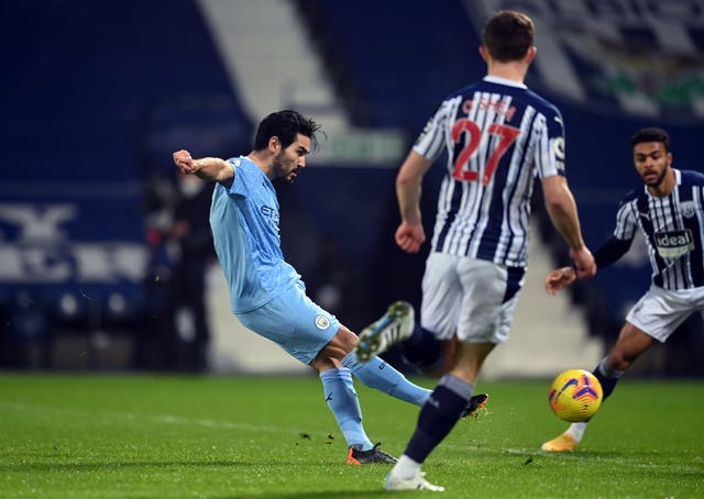 Ilkay Gundogan,left, opens the scoring