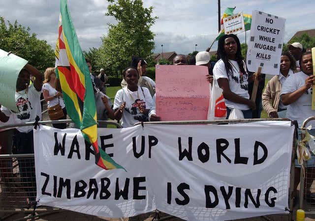 Anti-Mugabe protesters demonstrate outside the Riverside Ground in Chester le Street in 2003
