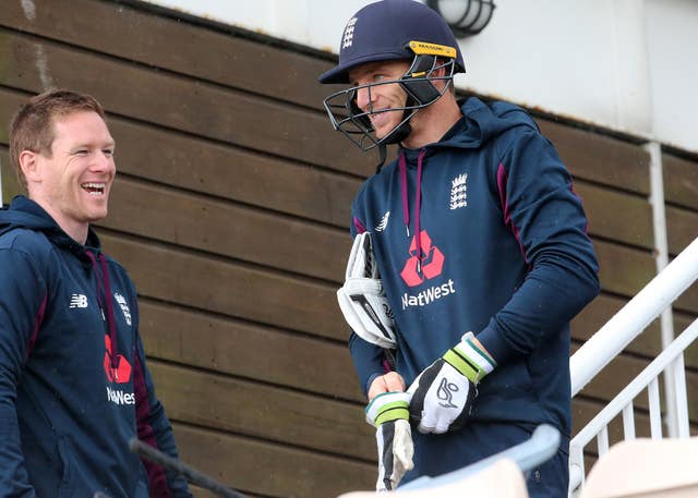 Eoin Morgan, left, shares a joke with Jos Buttler