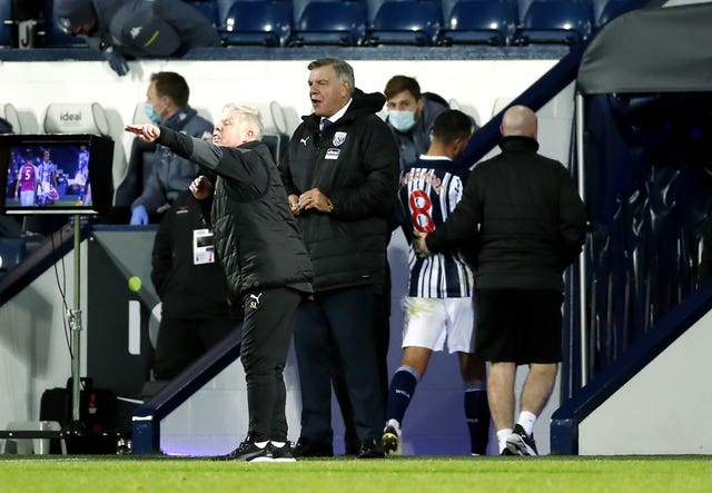 Jake Livermore, second right, is led down the tunnel after being sent off