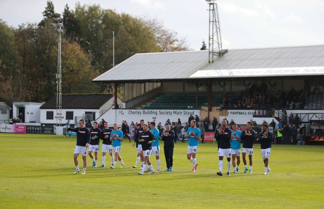 Yeovil players applaud the fans at Victory Park