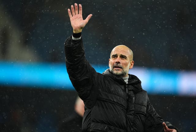 Manchester City manager Pep Guardiola acknowledges fans