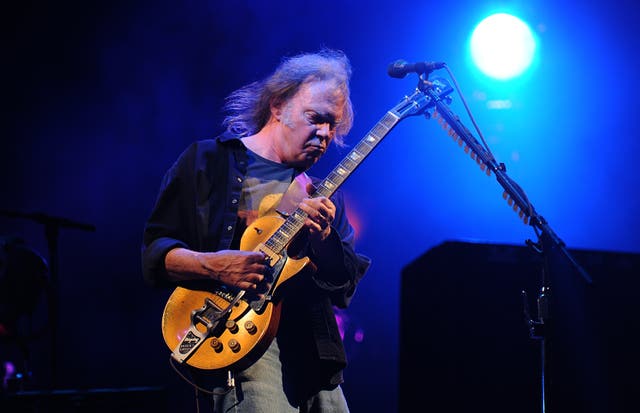 Neil Young performing on the Pyramid Stage during the 2009 Glastonbury Festival