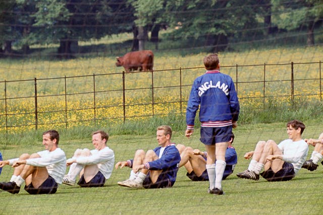 Norman Hunter, far right, trains under the supervision of Les Cocker at England's 1966 World Cup training camp at Lilleshall, Shropshire l