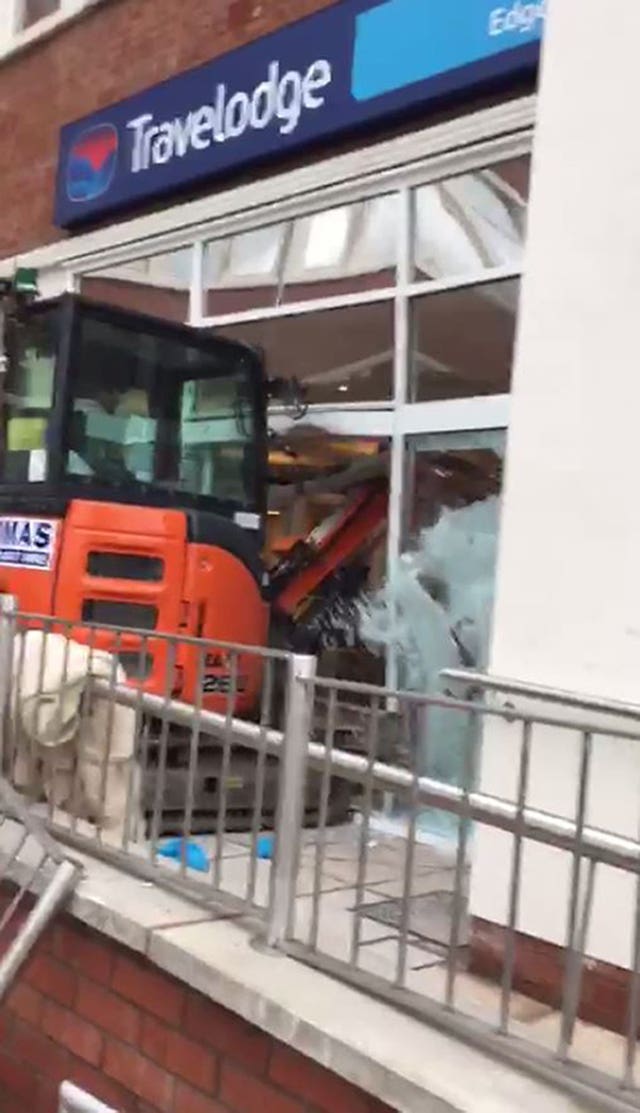 Digger driven into Travelodge