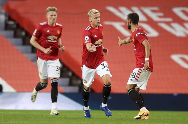 Manchester United's Donny Van De Beek (centre) celebrates scoring his side's first goal with his team-mates