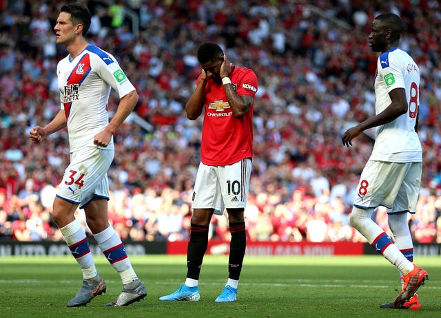 Marcus Rashford appears dejected after missing from the penalty spot 