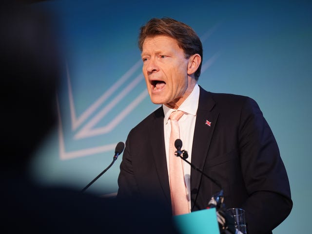 Richard Tice speaking into microphone