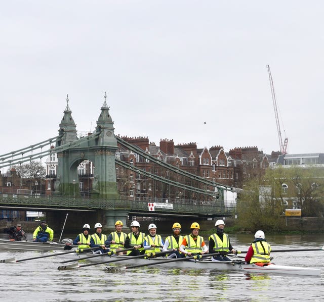 A group of rowers, including former British Olympians and Oxford and Cambridge boat race competitors, taking part in a demonstration in front of Hammersmith Bridge in west London over the Government’s inability to agree a repair plan for the bridge after almost two years