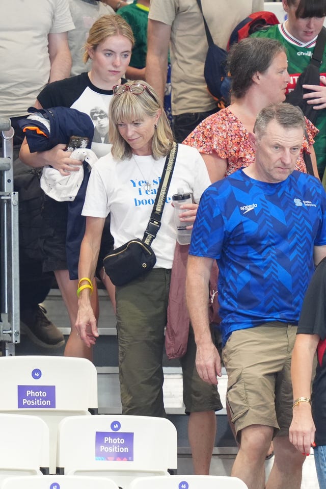 (left to right) Amelie, Kate and Gerry McCann in the stands after cheering on their son and brother Sean McCann taking part in the men’s 400m freestyle at the Tollcross International Swimming Centre in Glasgow