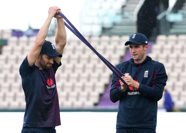 Mark Wood (left) and Chris Woakes are among the England squad members currently laid low by illness