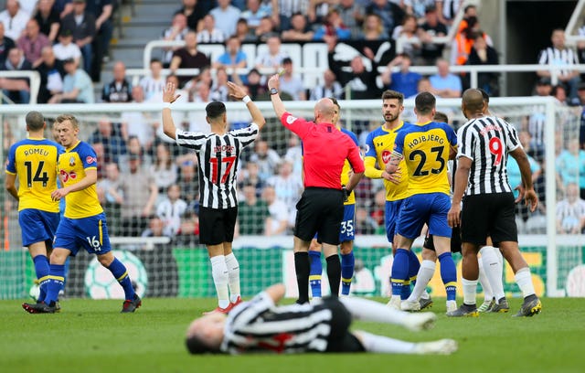 James Ward-Prowse is shown a yellow card after his cynical barge on Miguel Almiron