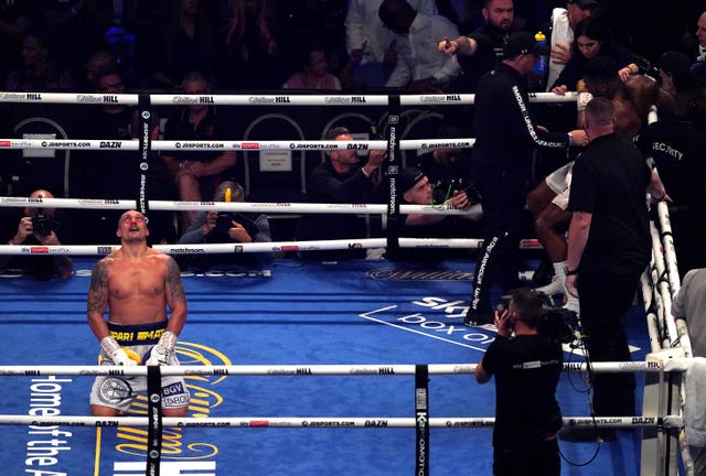 Oleksandr Usyk captured the WBA, IBF and WBO heavyweight titles with a masterful performance (Nick Potts/PA)