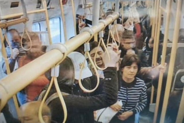 A busy Tube train between East Ham and Upton Park