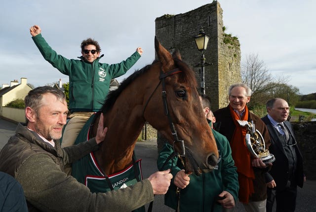 Sam Waley-Cohen sits on Noble Yeats outside the Lord Bagenal Inn
