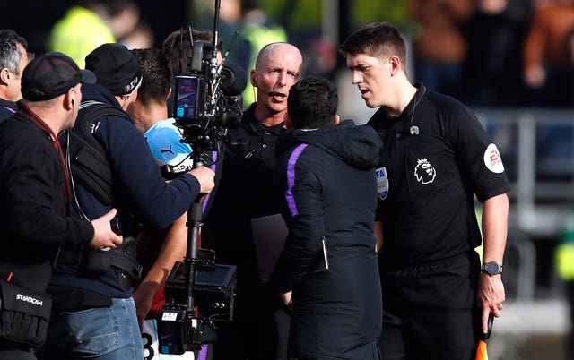 Mike Dean was confronted at full-time
