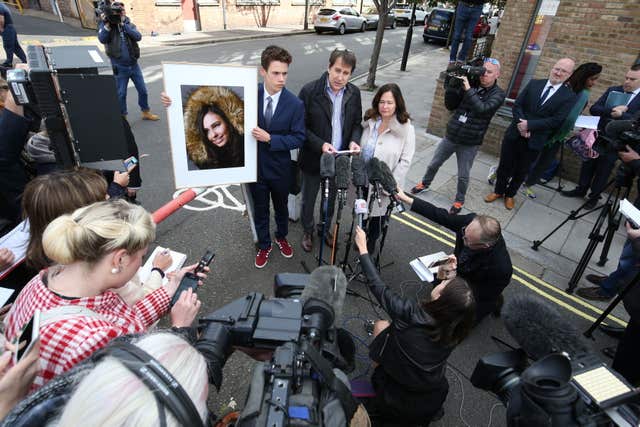 Nadim and Tanya Ednan-Laperouse, with their son Alex, speaking to the press outside court
