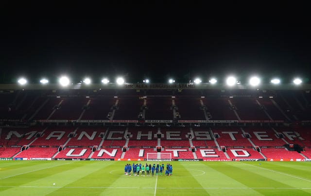 Old Trafford under floodlights