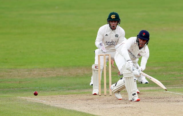 Lancashire’s Luke Wood (right) will resume on 63 not out