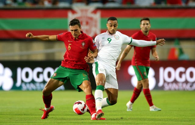 Portugal midfielder Joao Palhinha (left)