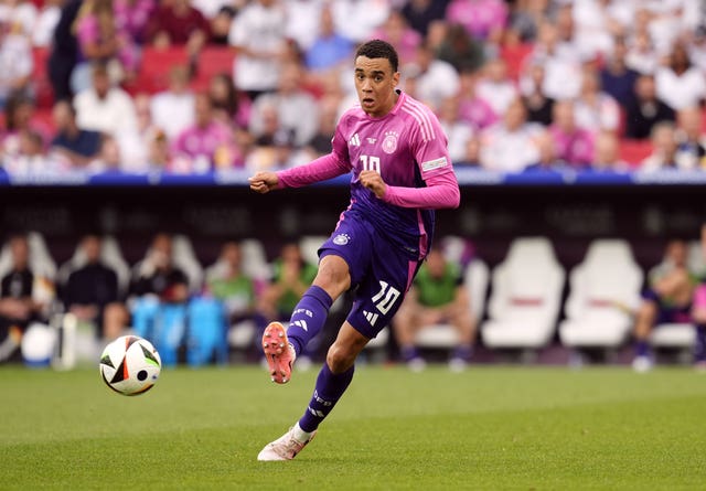 Germany’s Jamal Musiala looks forward as he passes the ball during Germany''s win over Hungary