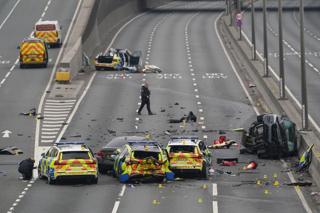 Damaged police cars at a crash scene on the A1 on Tyneside