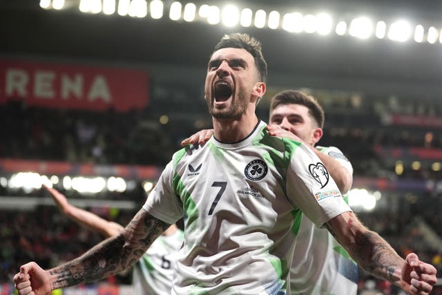 Troy Parrott celebrates opening the scoring