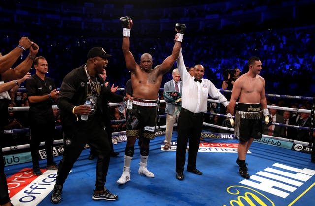 Dillian Whyte celebrates beating Joseph Parker