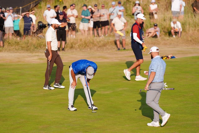 Bryson DeChambeau reacts after putting on 15th during day two