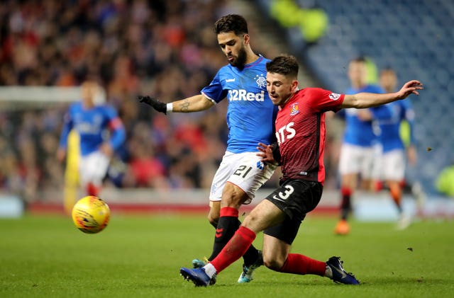 Greg Taylor in action against Rangers