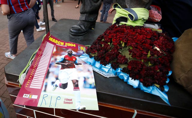 A tribute to Jlloyd Samuel outside the ground before a match at Villa Park, Birmingham